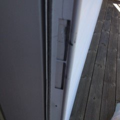 Holes cut in Z Bar for latch